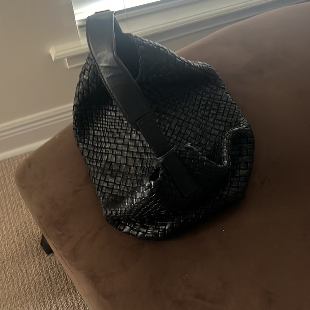 Genuine, leather inside and out, pockets for glasses and phone like new